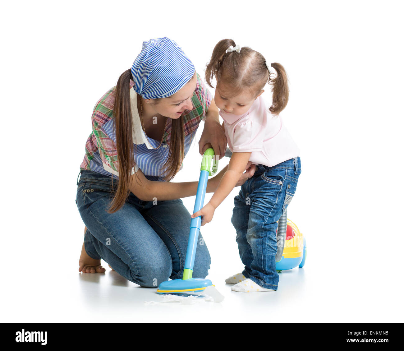 Little girl and woman with vacuum cleaner isolated Stock Photo