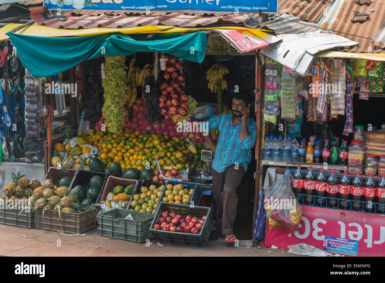 India, port city of Cochin. Typical street scene with corner produce vendor. Stock Photo