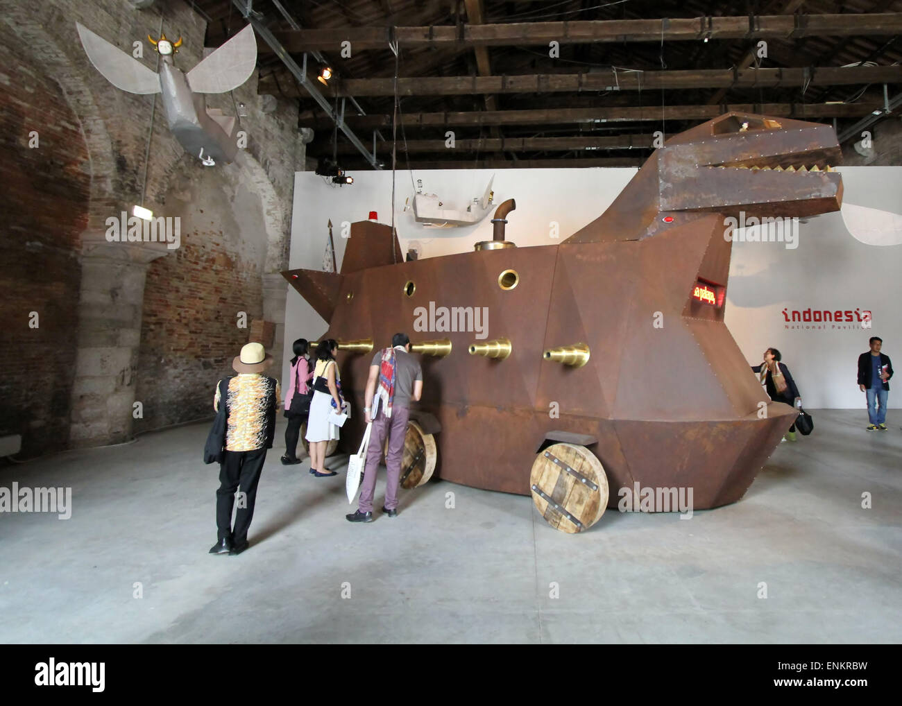 Venice, Italy. 6th May, 2015. A visitor looks at an installation by Indonesian artist Hory Dono nemed 'Voyage Trakomod' at the pavilion of Indonesia during the 56th International Art Exhibition (Biennale d'Arte) titled 'All the World's Futures' on May 6, 2015 in Venice Credit:  Andrea Spinelli/Alamy Live News Stock Photo