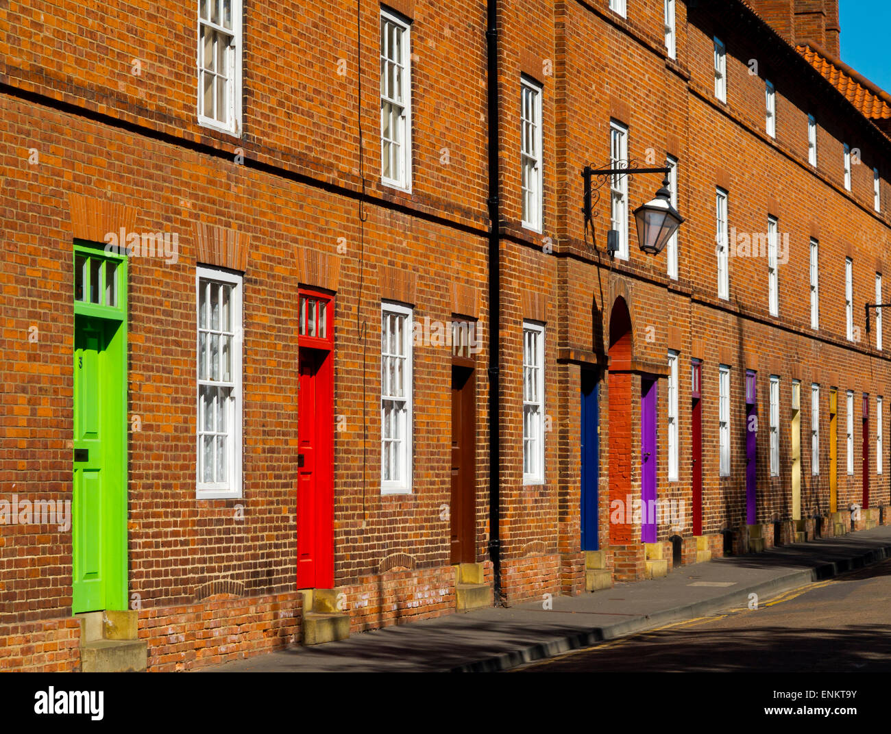 Terraced houses with painted doors in Newark on Trent a traditional