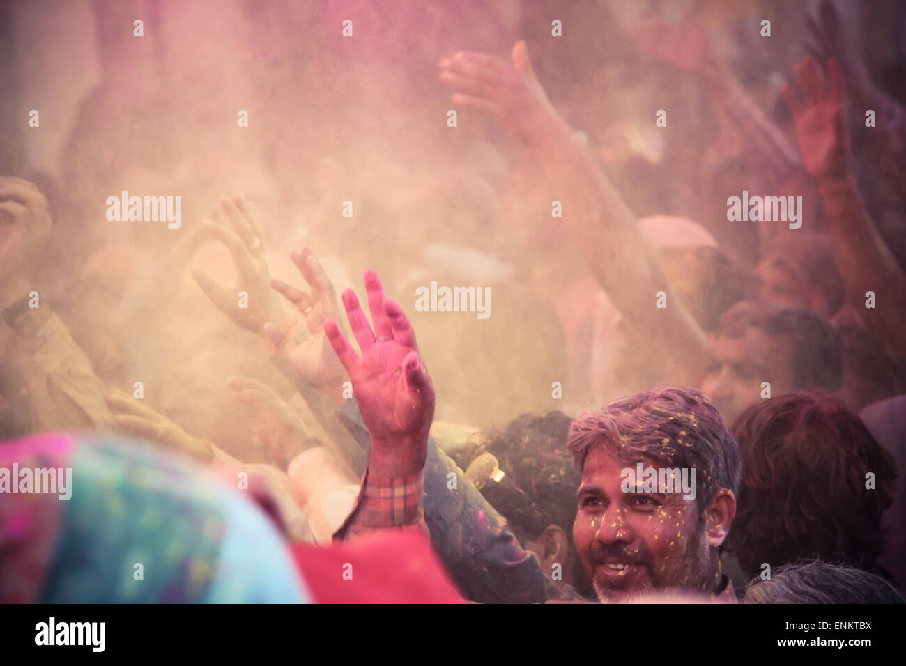 BARSANA - MAR 09: Devotees celebrate the traditional and a ritualistic Holi at Radharani temple on March 09, 2014 in Barsana, In Stock Photo