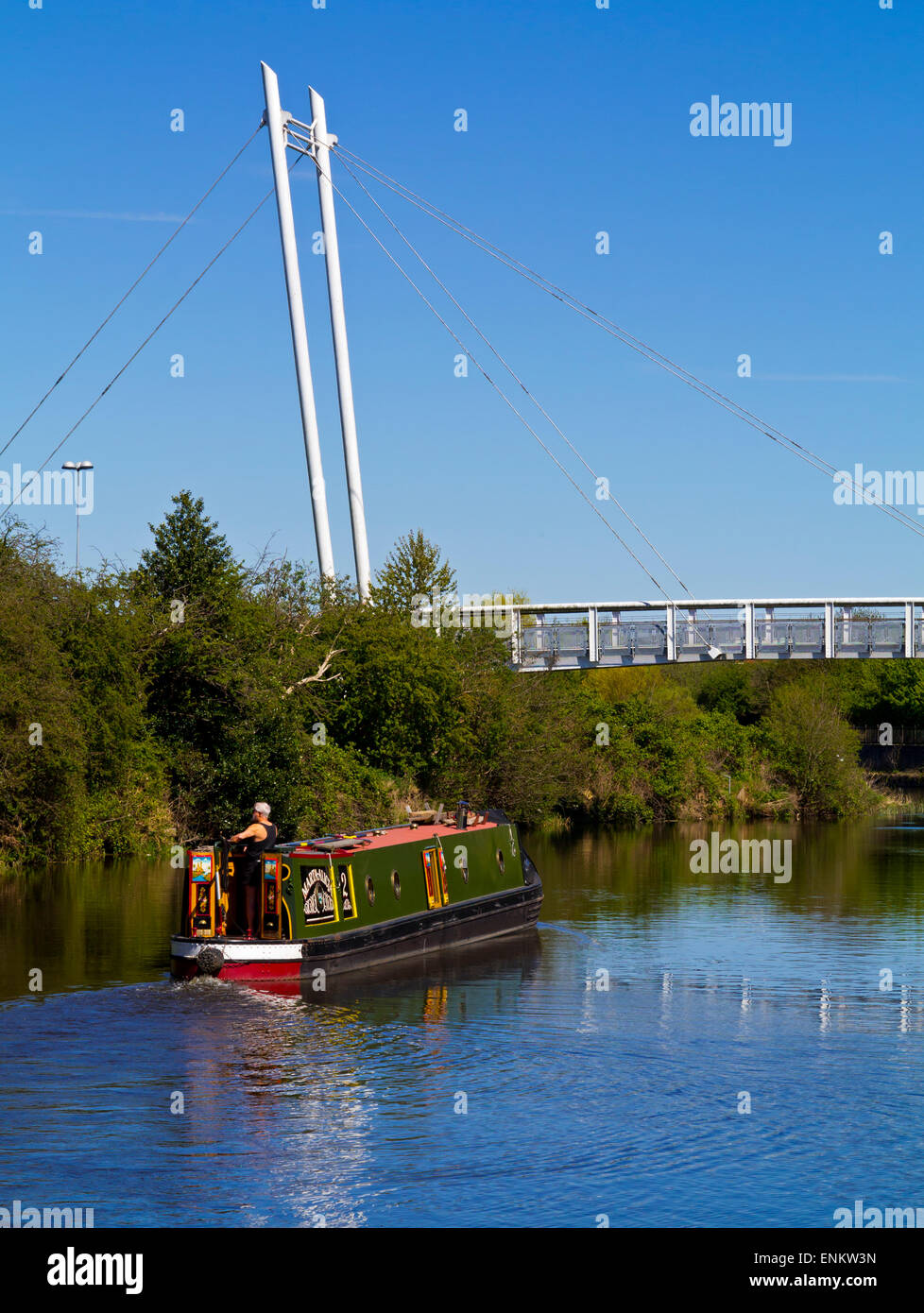 Canal boat and footbridge on the River Trent in Newark on Trent Nottinghamshire England UK Stock Photo