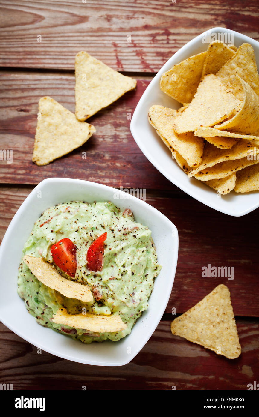 Homemade guacamole with tortilla chips Stock Photo Alamy