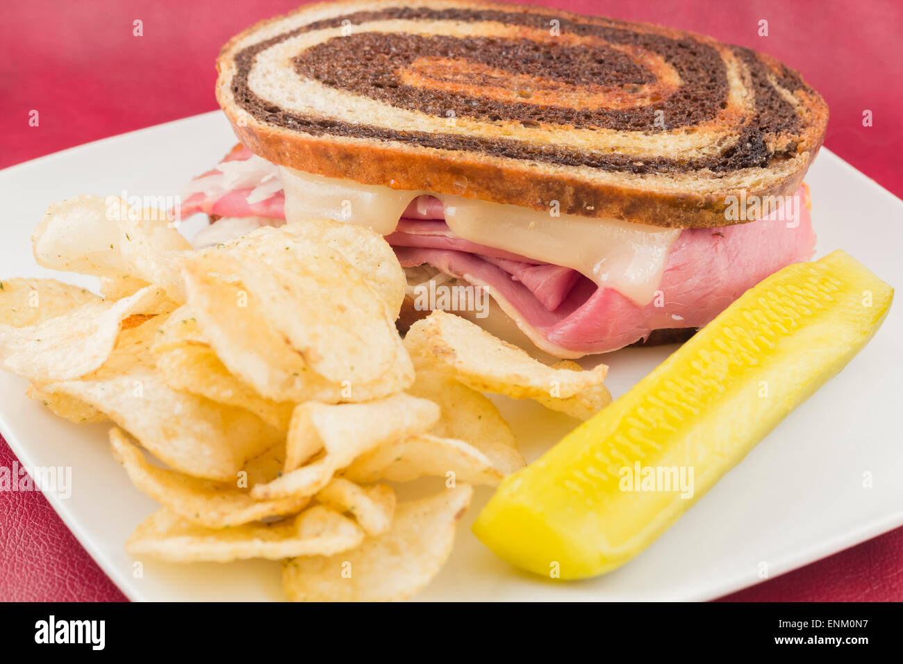 Classic reuben sandwich on pumpernickel swirl rye bread. A hearty meal