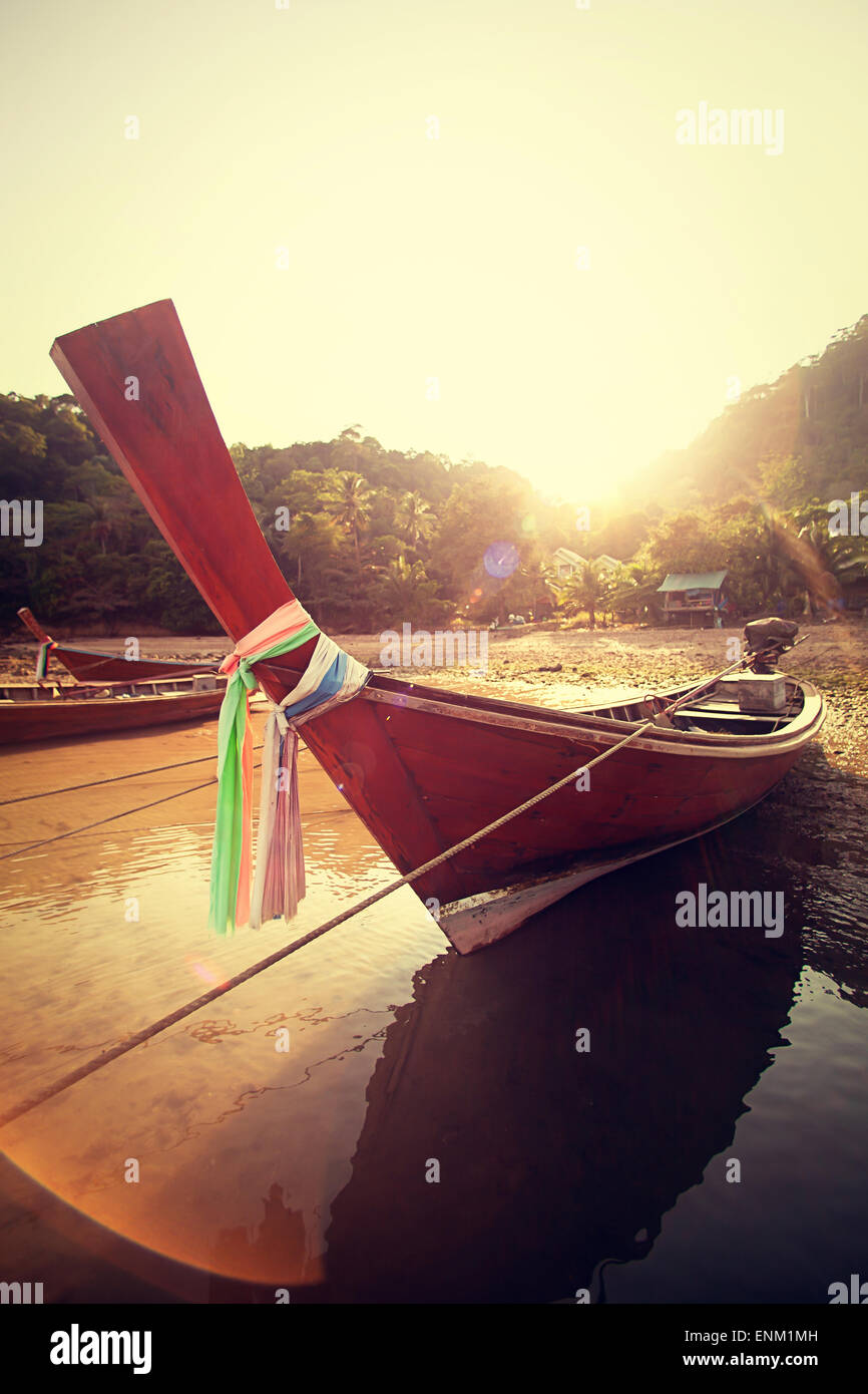 traditional thai boat, the sun sets in the town of gypsies Stock Photo