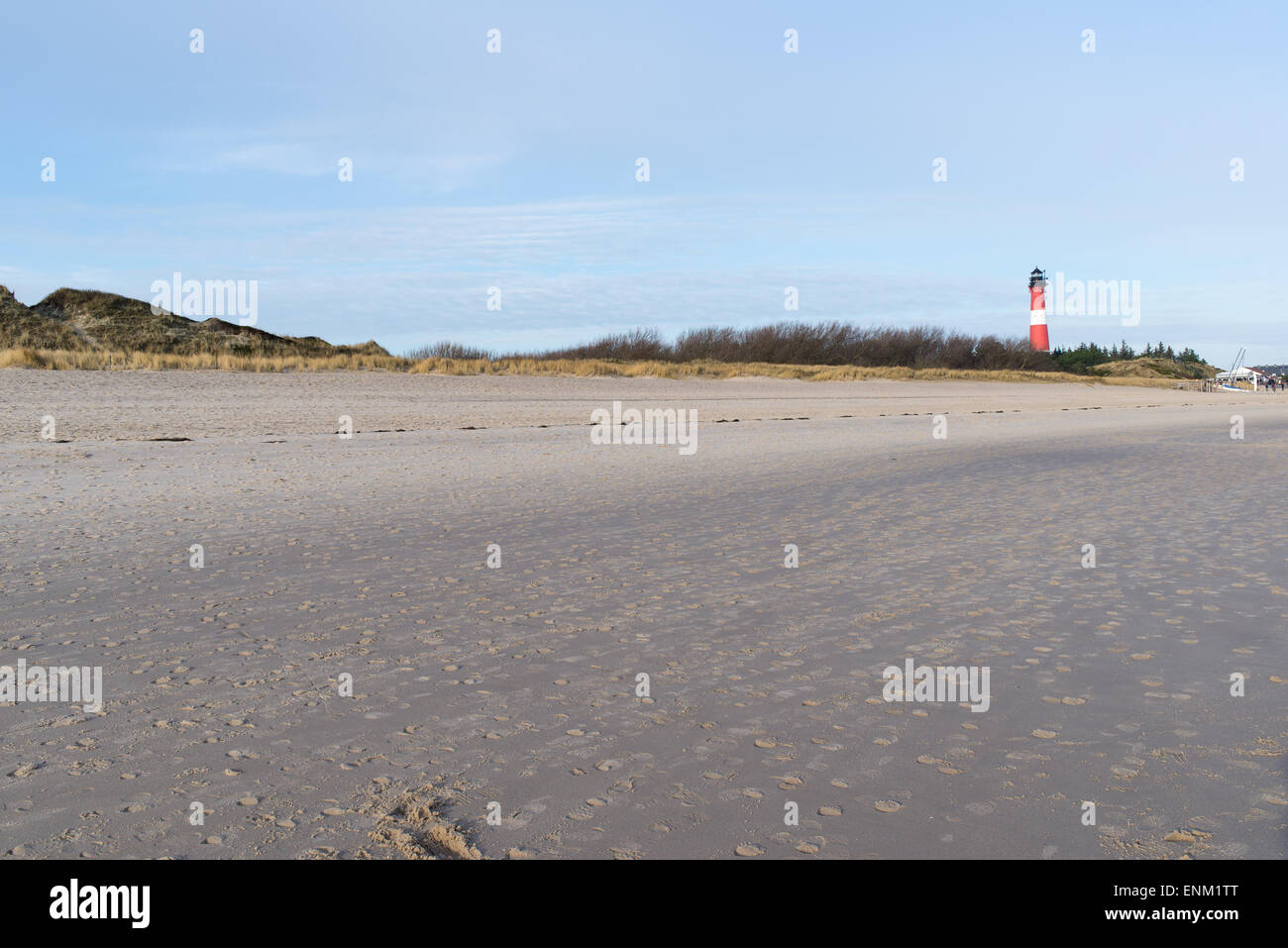 Beach of Hörnum in Sylt, Germany with red and white light house Stock Photo