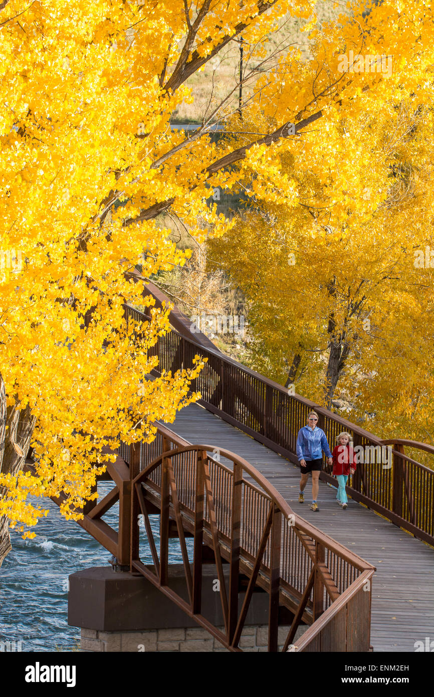 A mother and daughter walking on the Animas River Trail in Durango, Colorado. Stock Photo