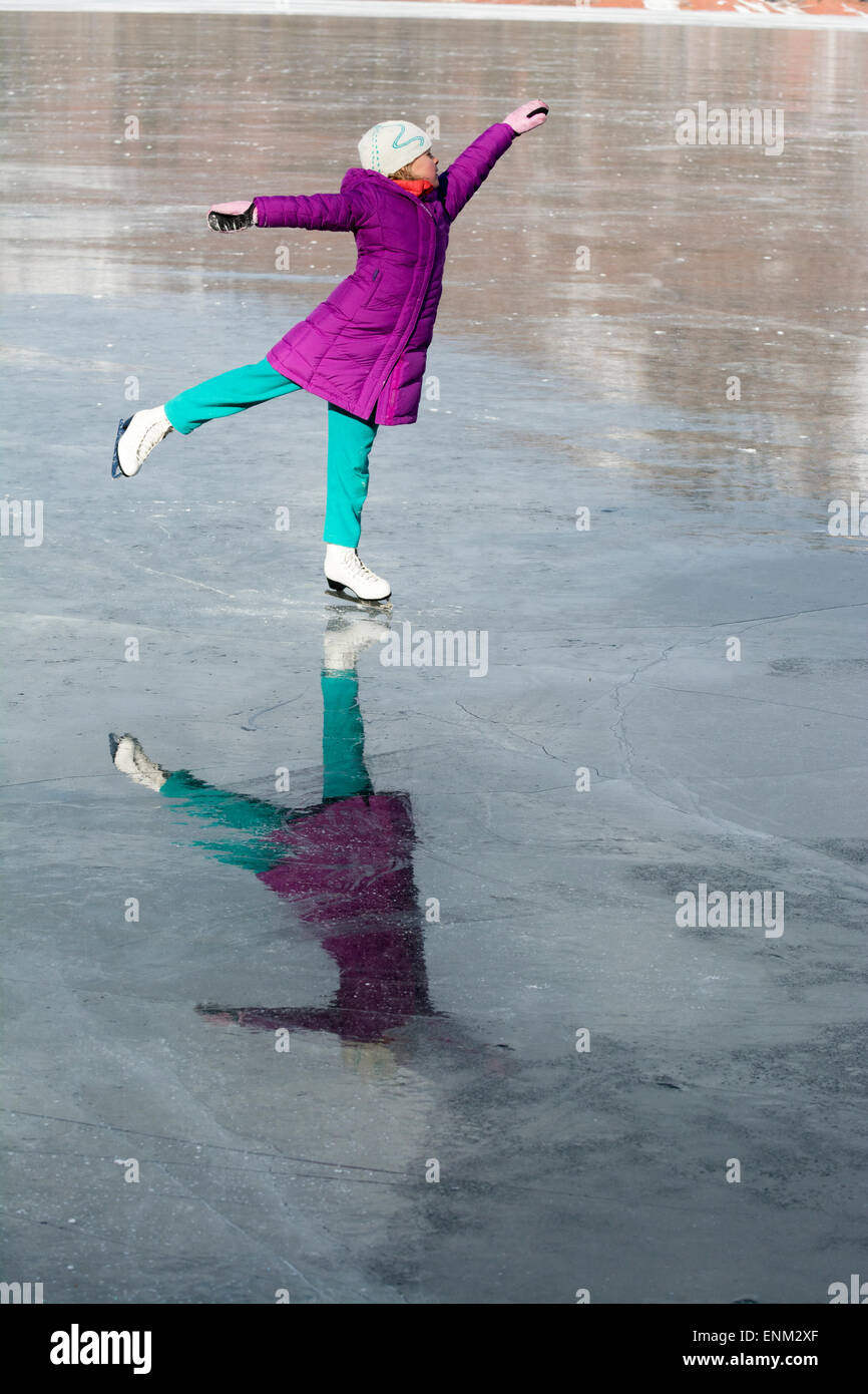 Child ice skating hi-res stock photography and images - Alamy
