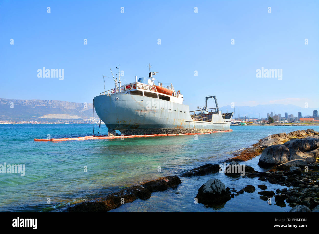 old cargo boat stranded on the rocks in croatia Stock Photo