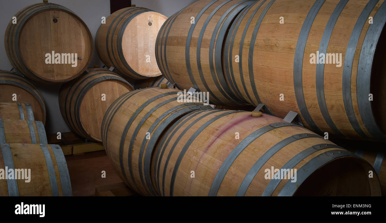 Wine barrels stacked in cellar hi-res stock photography and images - Alamy