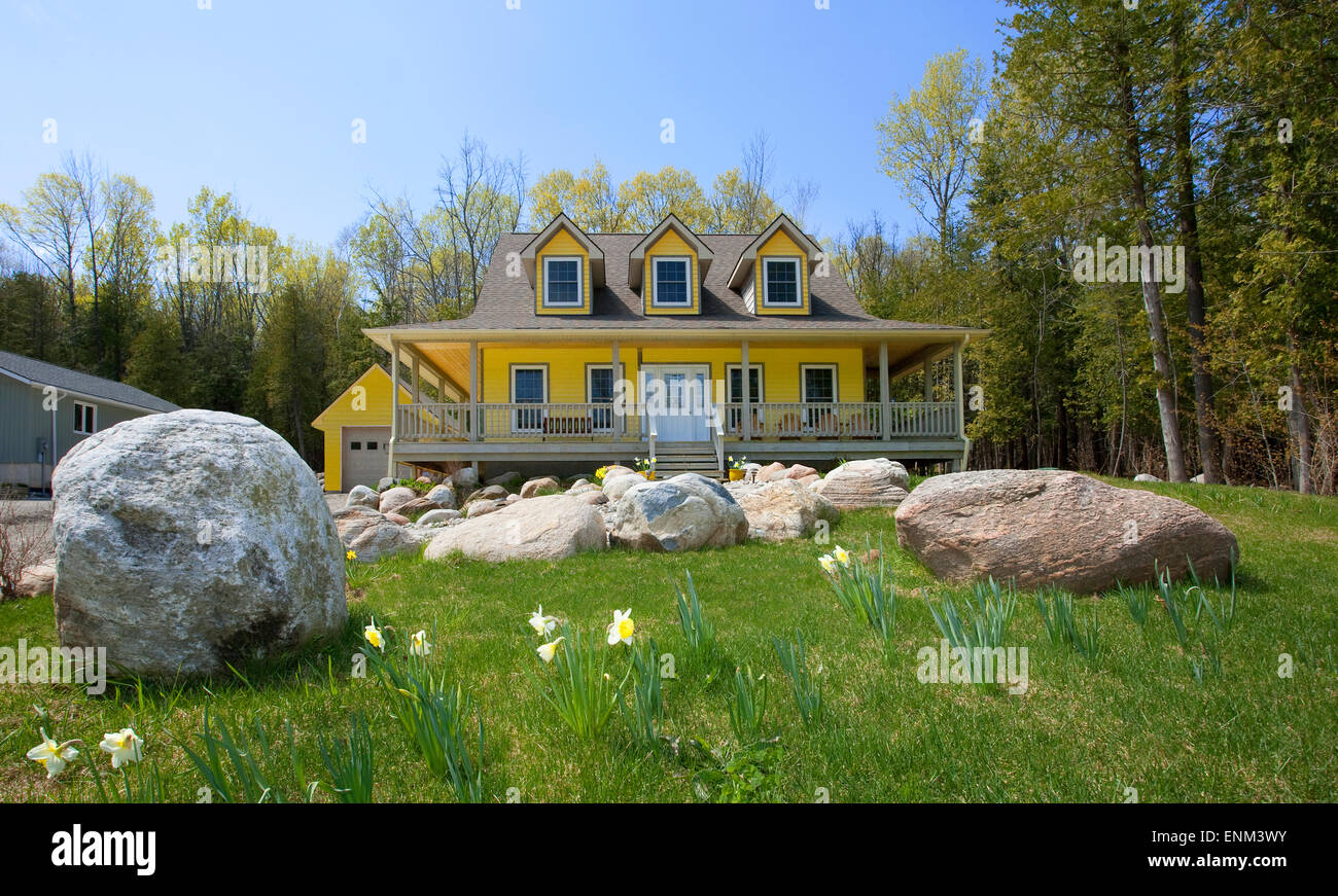 house with veranda and dormer windows North America, Canada, Ontario Stock Photo