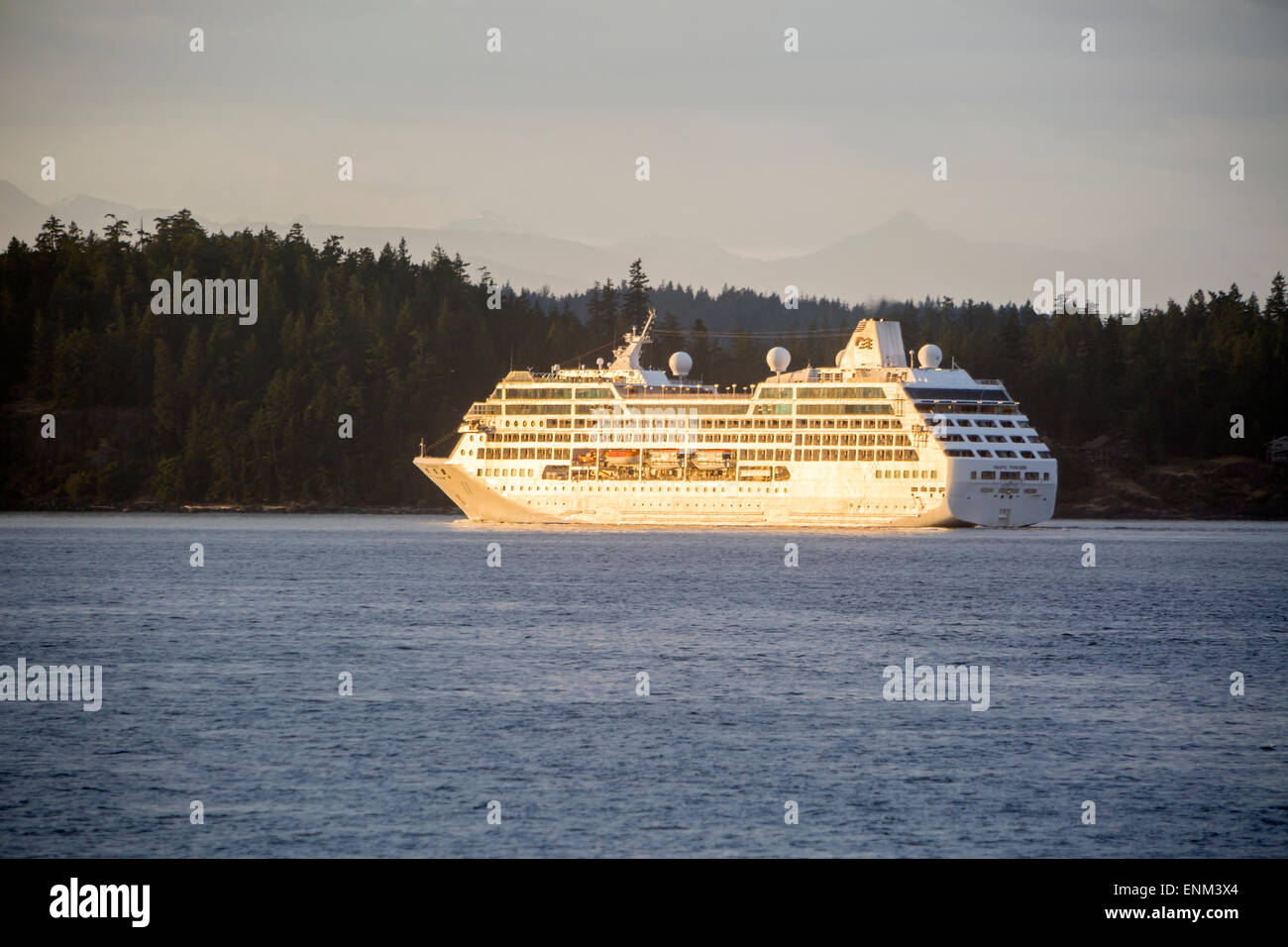 Pacific Princess cruise ship sailing the Inside Passage between Vancouver Island and Quadra Island, British Columbia, Canada Stock Photo