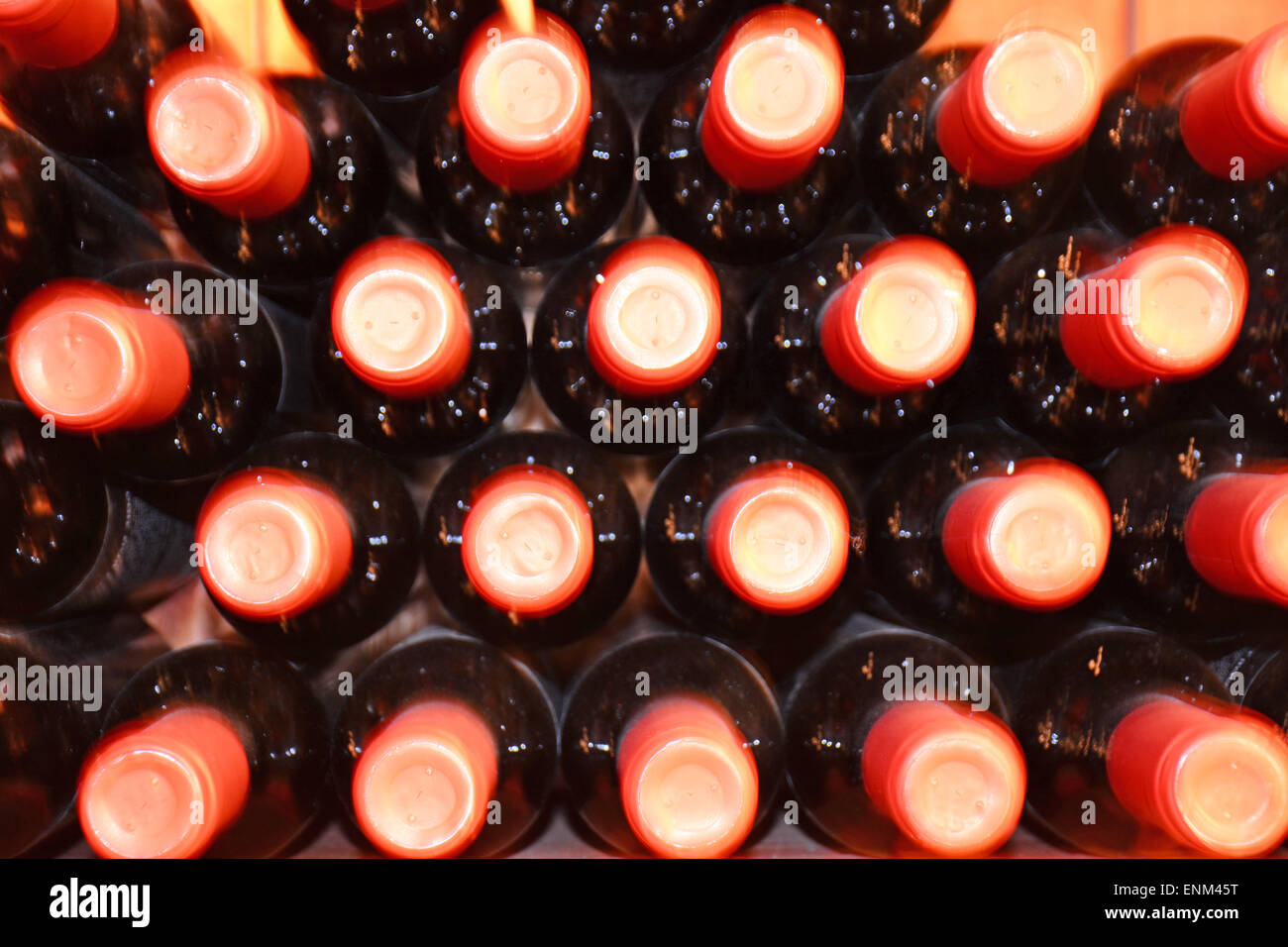 Red wine bottles caps Stock Photo - Alamy