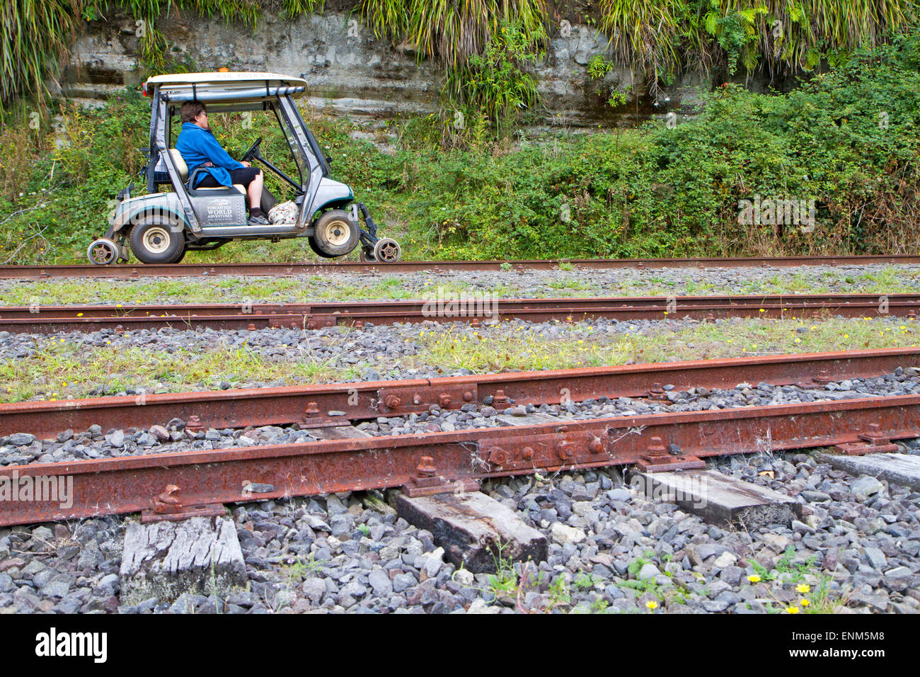 Converted golf carts on the old Forgotten World railway in New Zealand Stock Photo