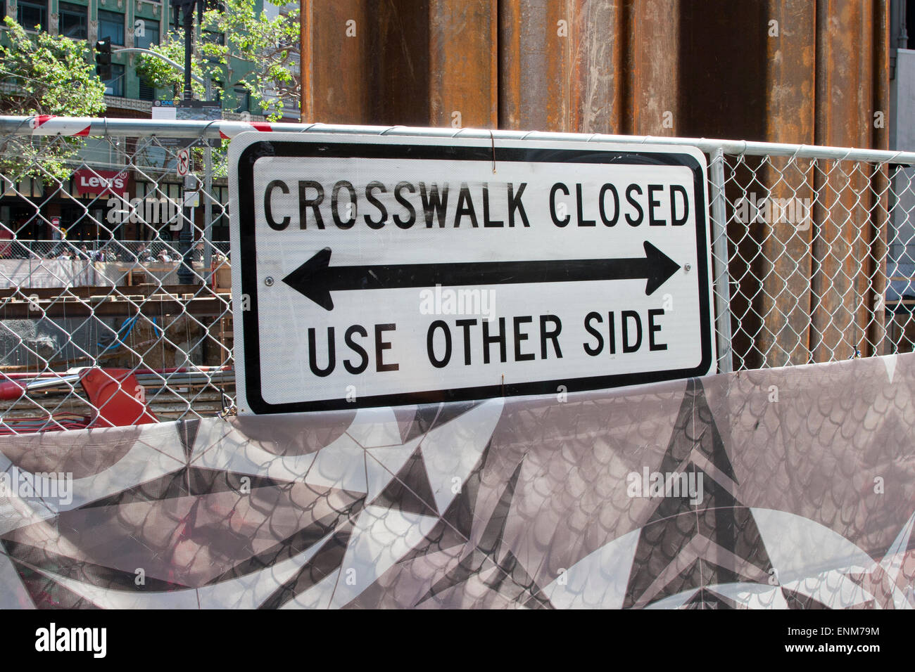 "Crosswalk Closed" sign at the new BART construction site at Stockton and Market Street in San Francisco, California. Stock Photo