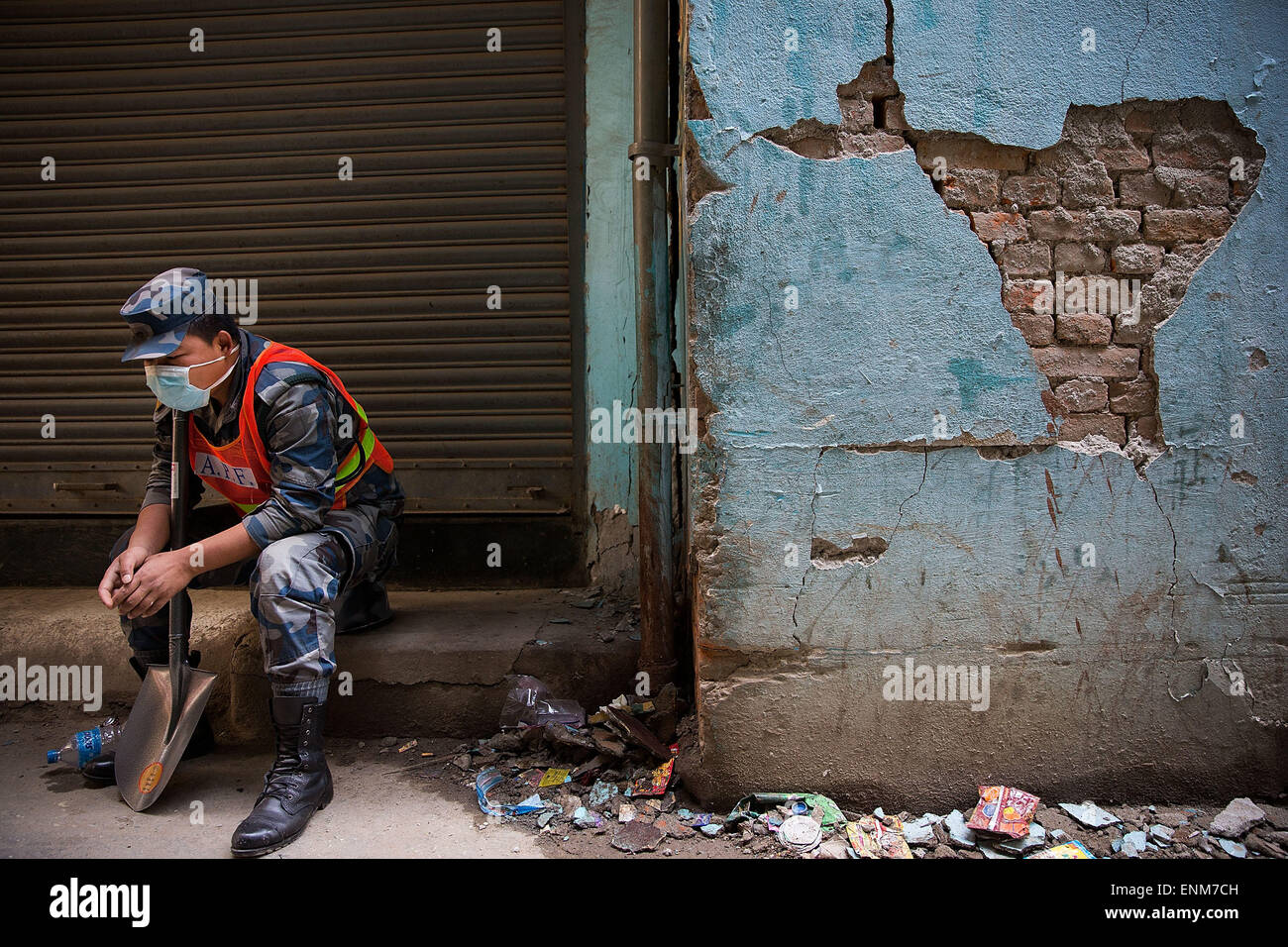 Kathmandu, Nepal. 1st May, 2015. A tired Nepali soldier takes a break