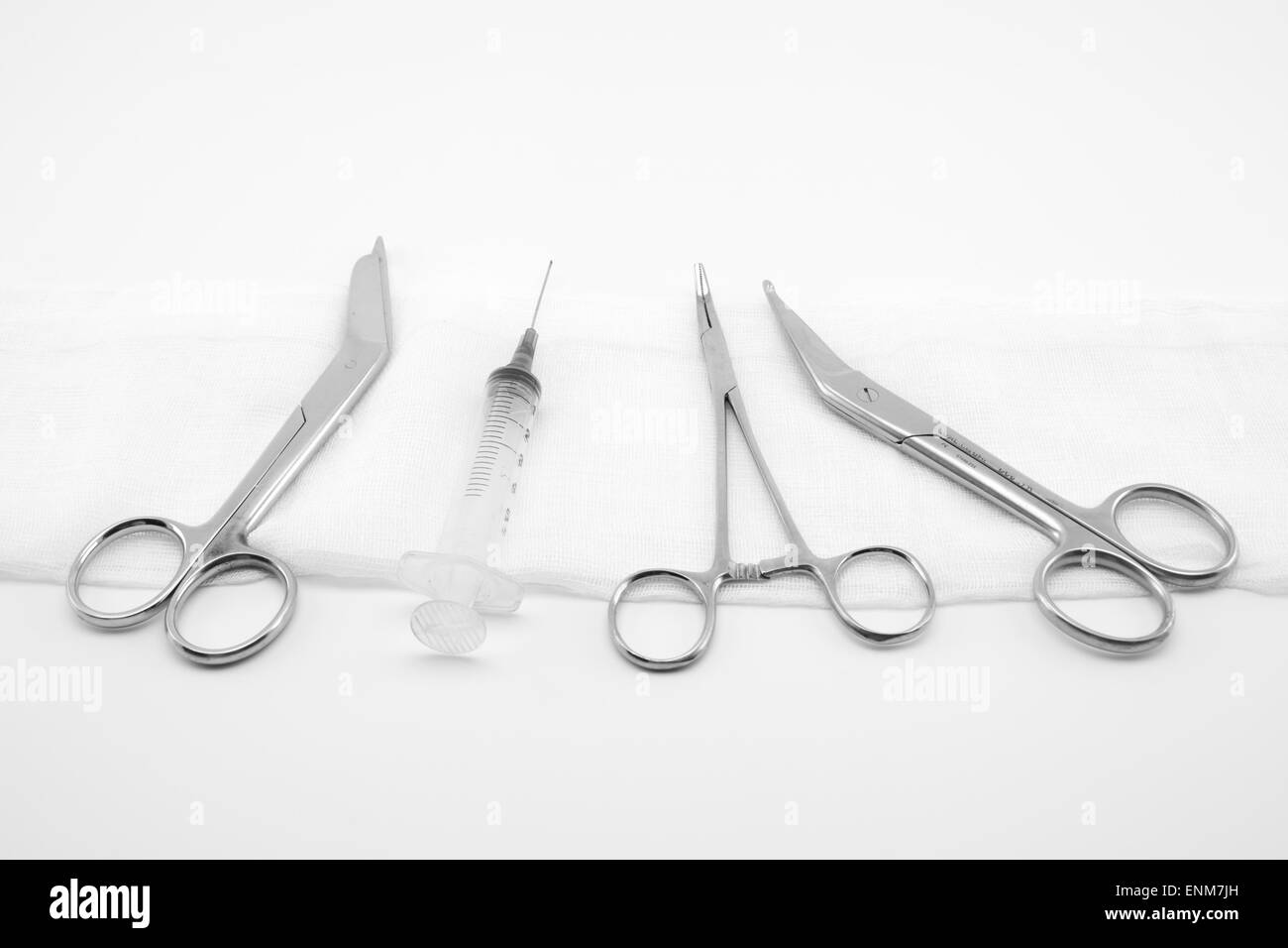 surgical composition with forceps, scissors and syringe Stock Photo