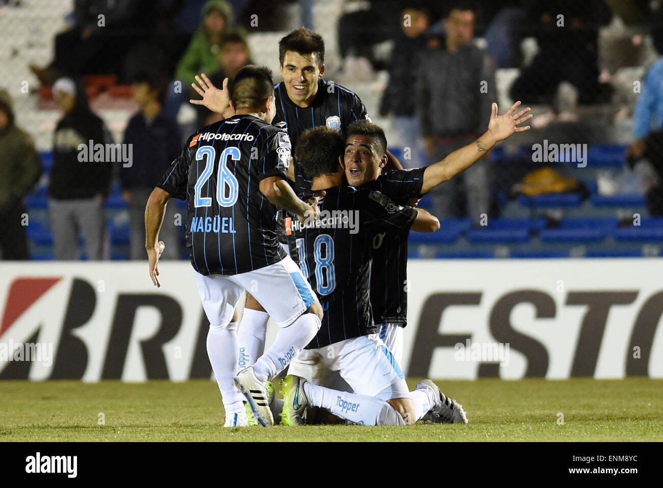 Montevideo, Uruguay. 7th May, 2015. Brian Fernandez (R) of Argentina's Racing  Club, celebrates after scoring against Uruguay's Wanderers, during the  first leg match of the Libertadores Cup round of 16, at Gran