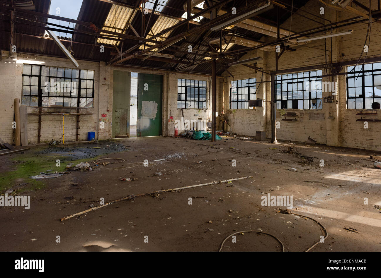 Inside a warehouse in a derelict abandoned industrial yard Stock Photo
