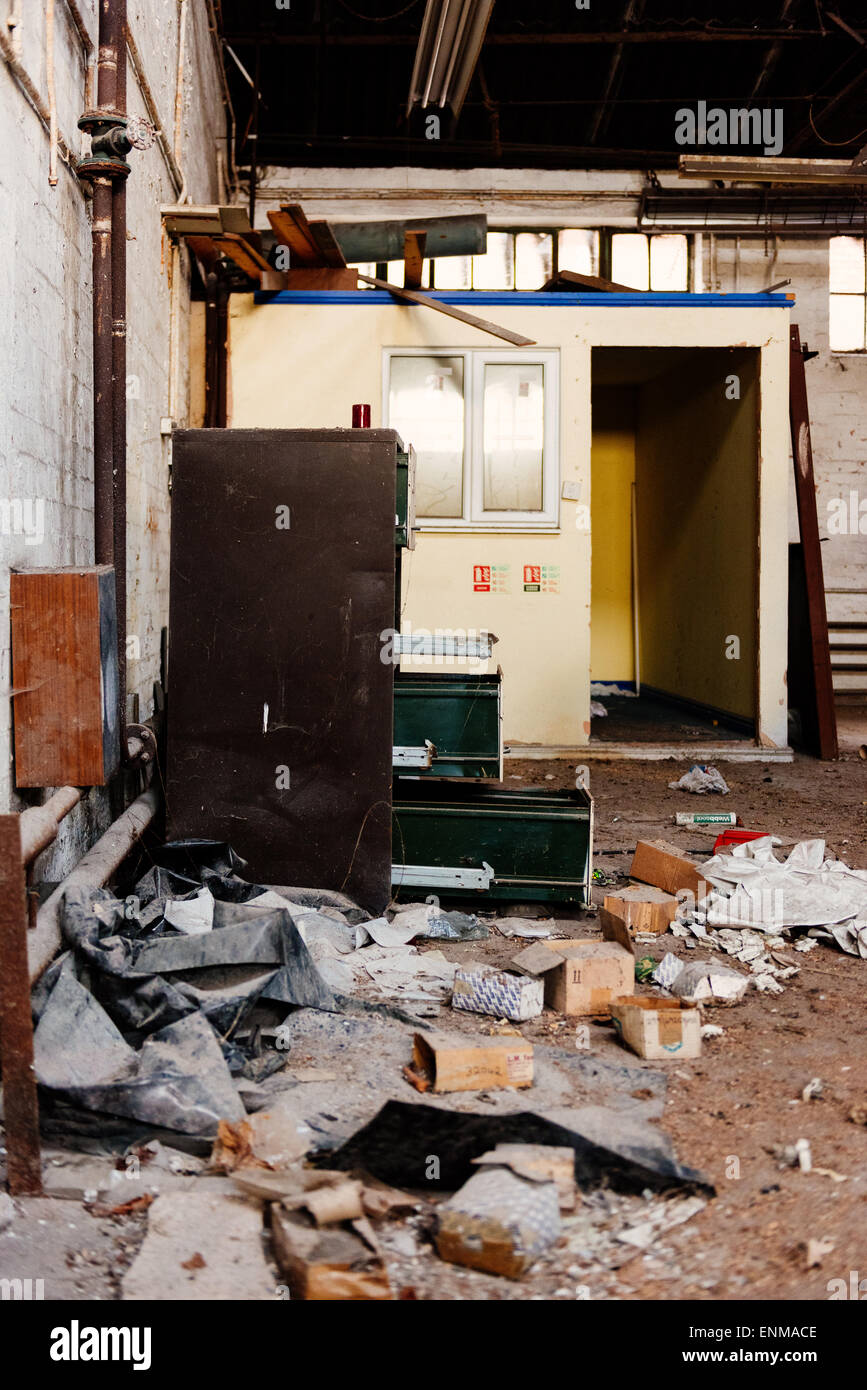 Disused derelict office with filing cabinet Stock Photo