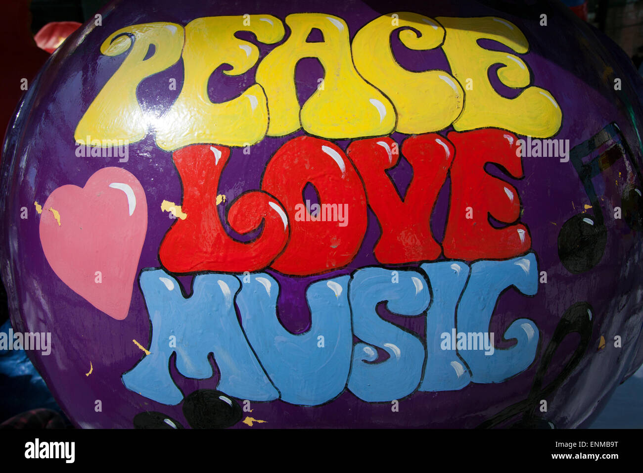 'Peace Love Music' painting at the Duck festival in the foyer of Liverpool's Mann Island, Merseyside, UK Stock Photo