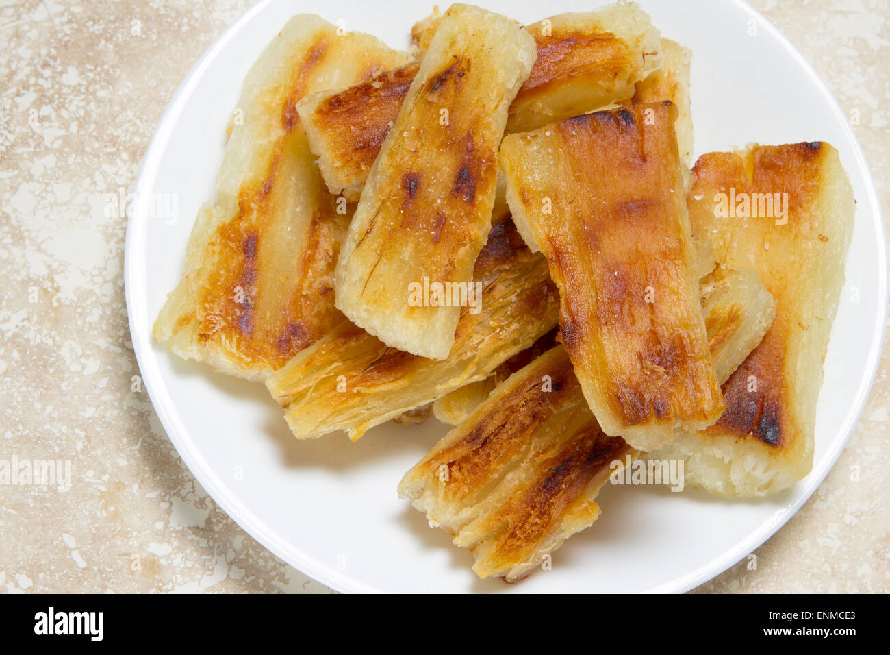 Grilled yucca root from overhead Stock Photo Alamy