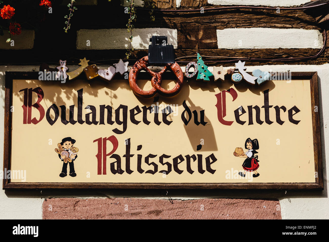 Shop sign, detail of building, Kaysersberg, Alsace, France Stock Photo