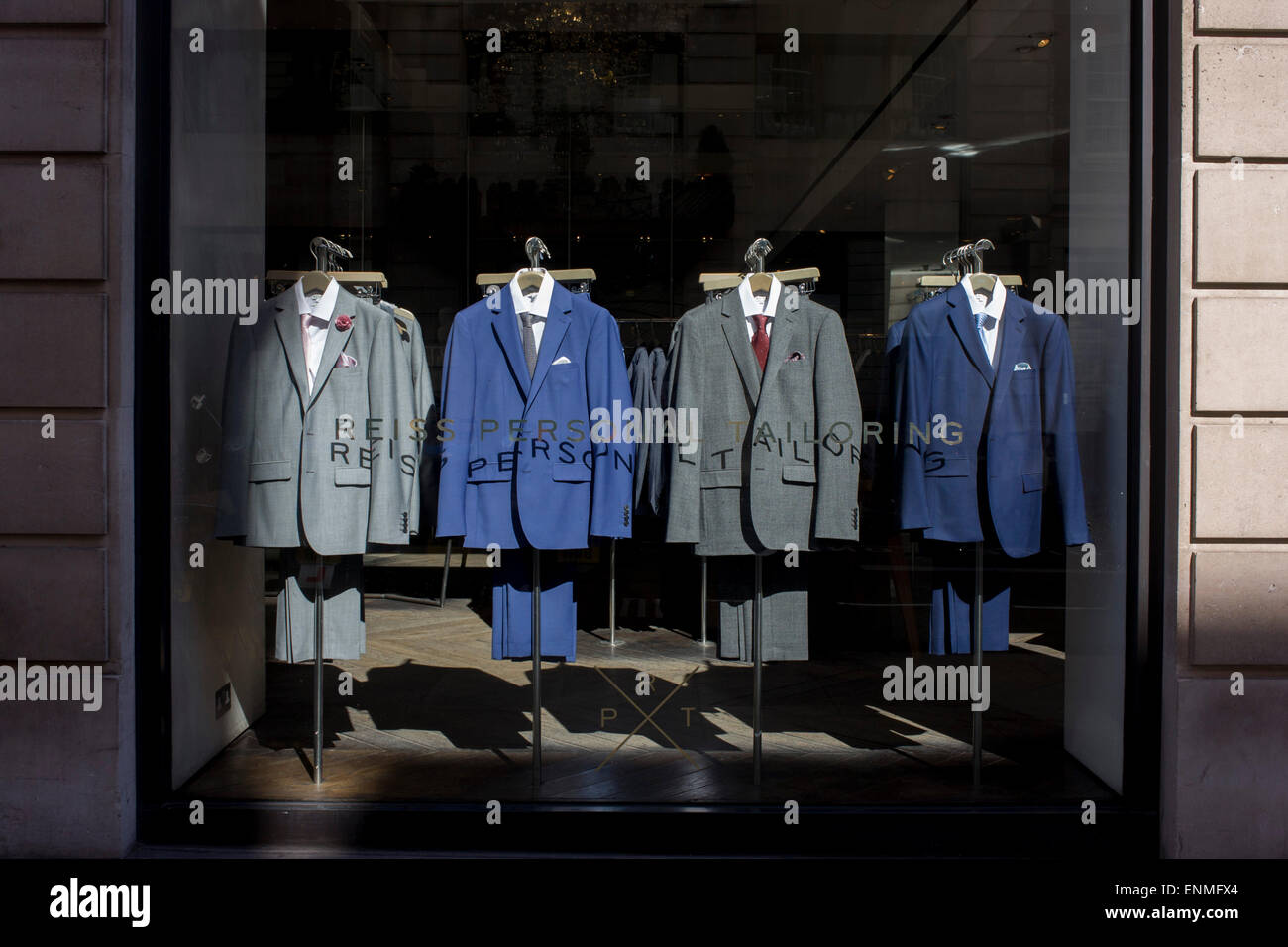 Reiss shop suits on display in a central London window Stock Photo Alamy