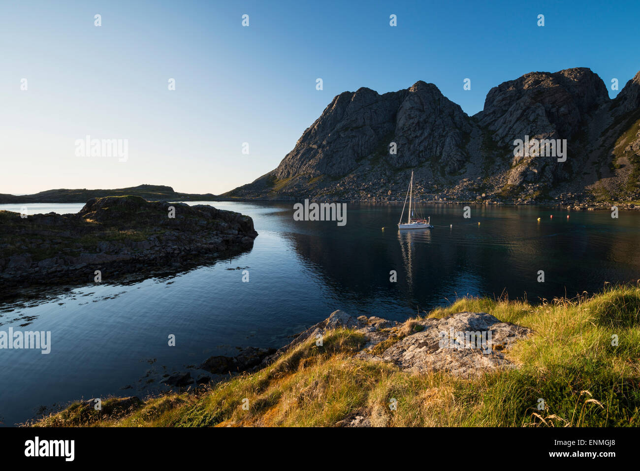 Sailboat anchorage at Buvågen bay at Helle on the westernmost tip of Moskenesøy, Lofoten Islands, Norway Stock Photo