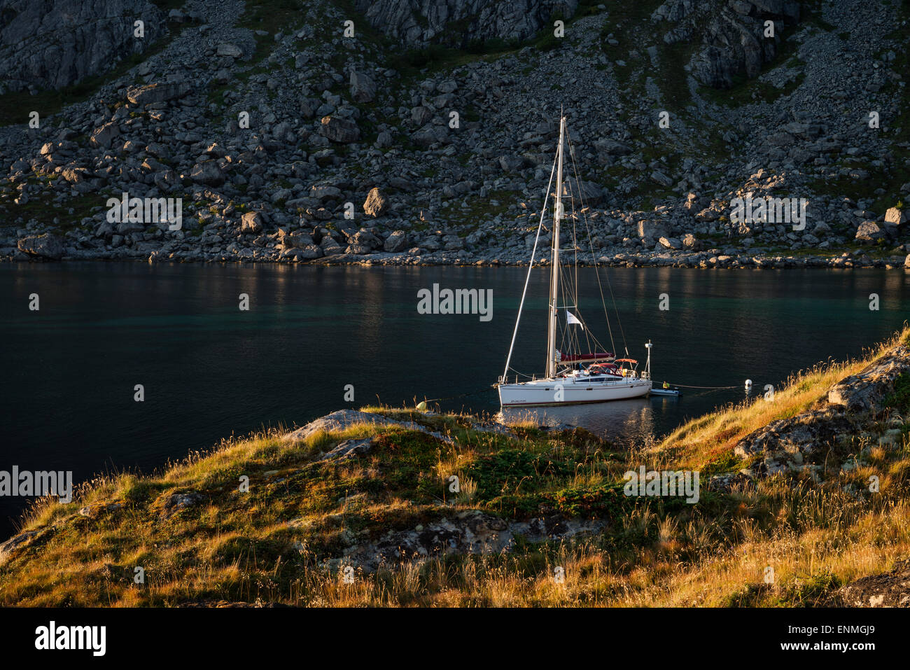 Sailboat anchorage at Buvågen bay at Helle on the westernmost tip of Moskenesøy, Lofoten Islands, Norway Stock Photo