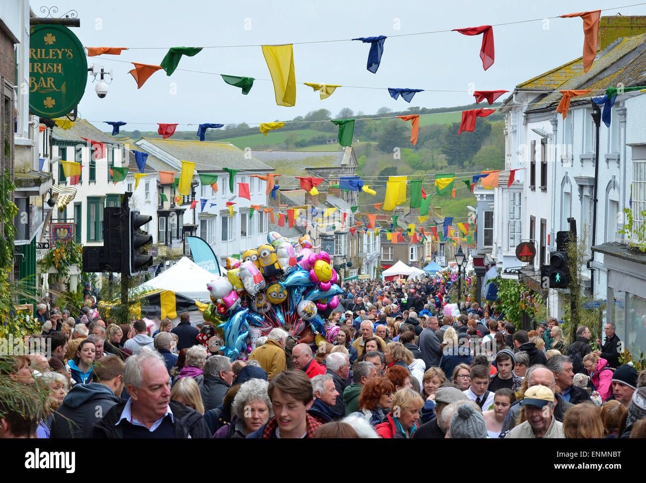 The streets of Helston in Cornwall, UK are packed with people during the annual flora day celebrations Stock Photo