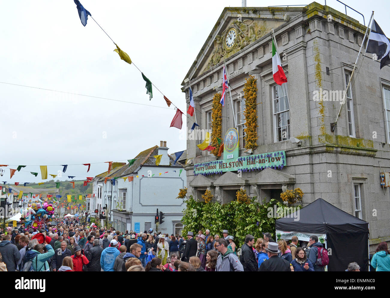 The streets of Helston in Cornwall, UK are packed with people during the annual flora day celebrations Stock Photo