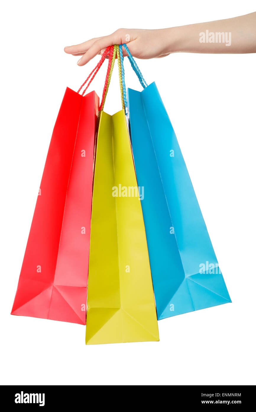 Female hand holding shopping paper bags Stock Photo