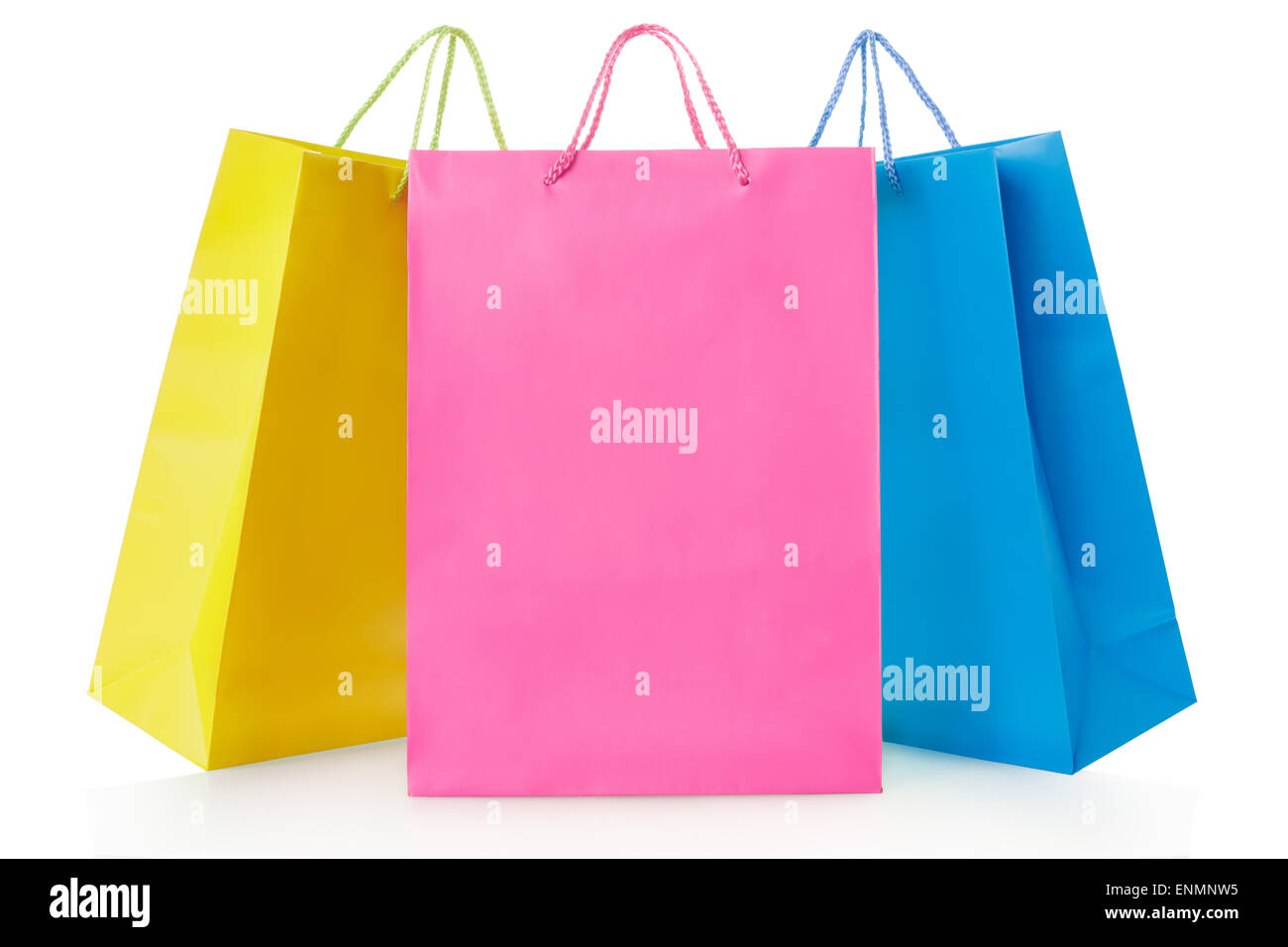 Colorful shopping bags in paper in yellow, pink and blue colors Stock Photo