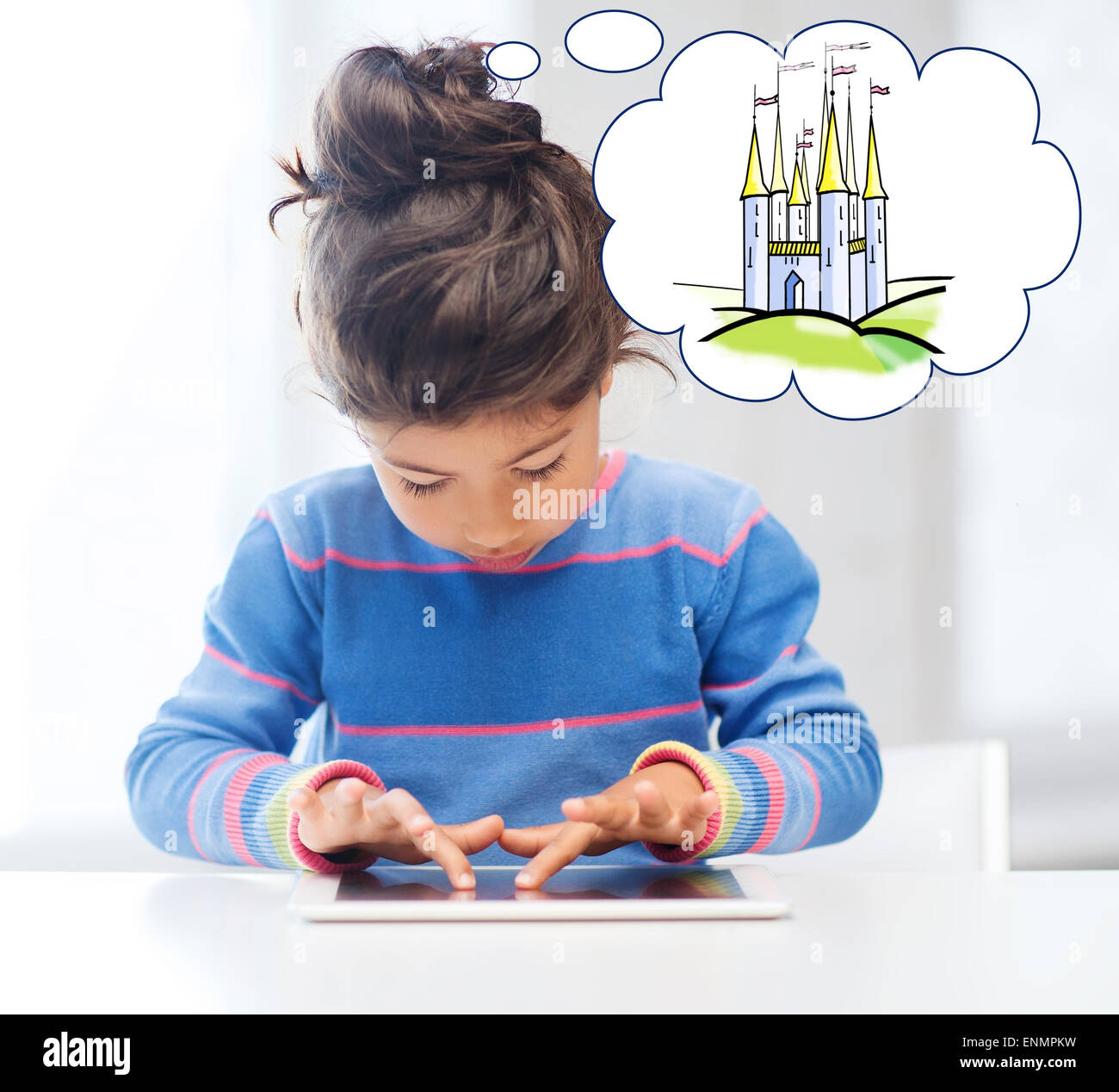 little girl with tablet pc at home Stock Photo - Alamy