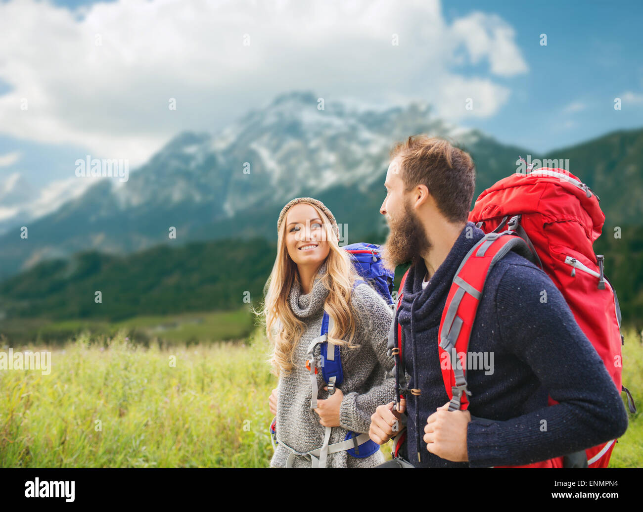 Smiling man woman hiking mountains hi-res stock photography and images ...