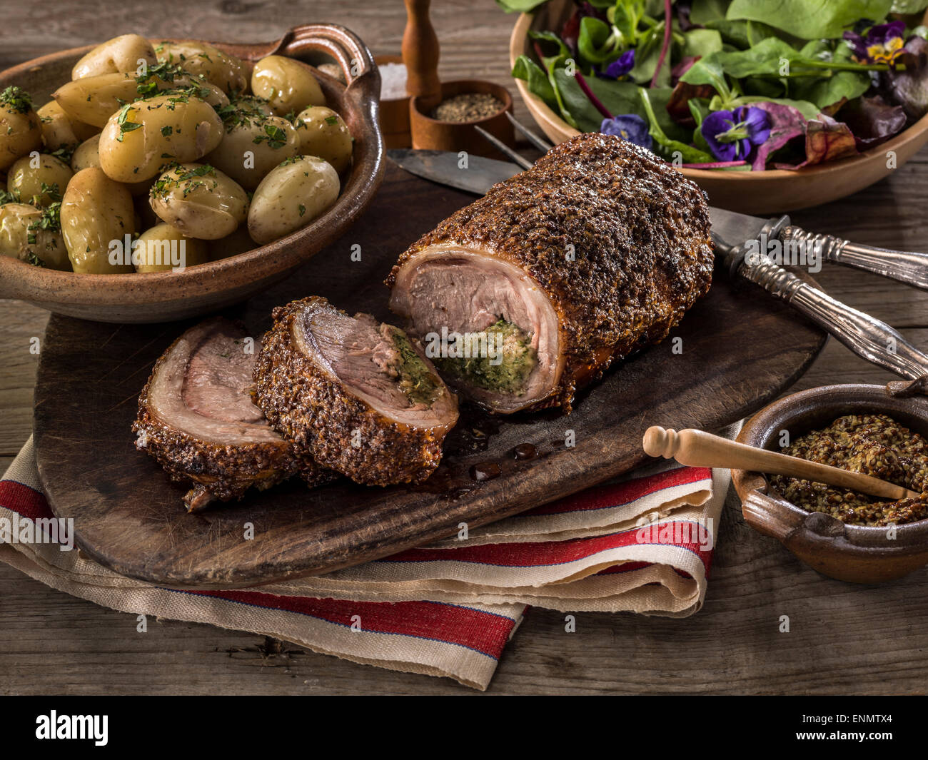 Lamb loin with herb stuffing Stock Photo - Alamy