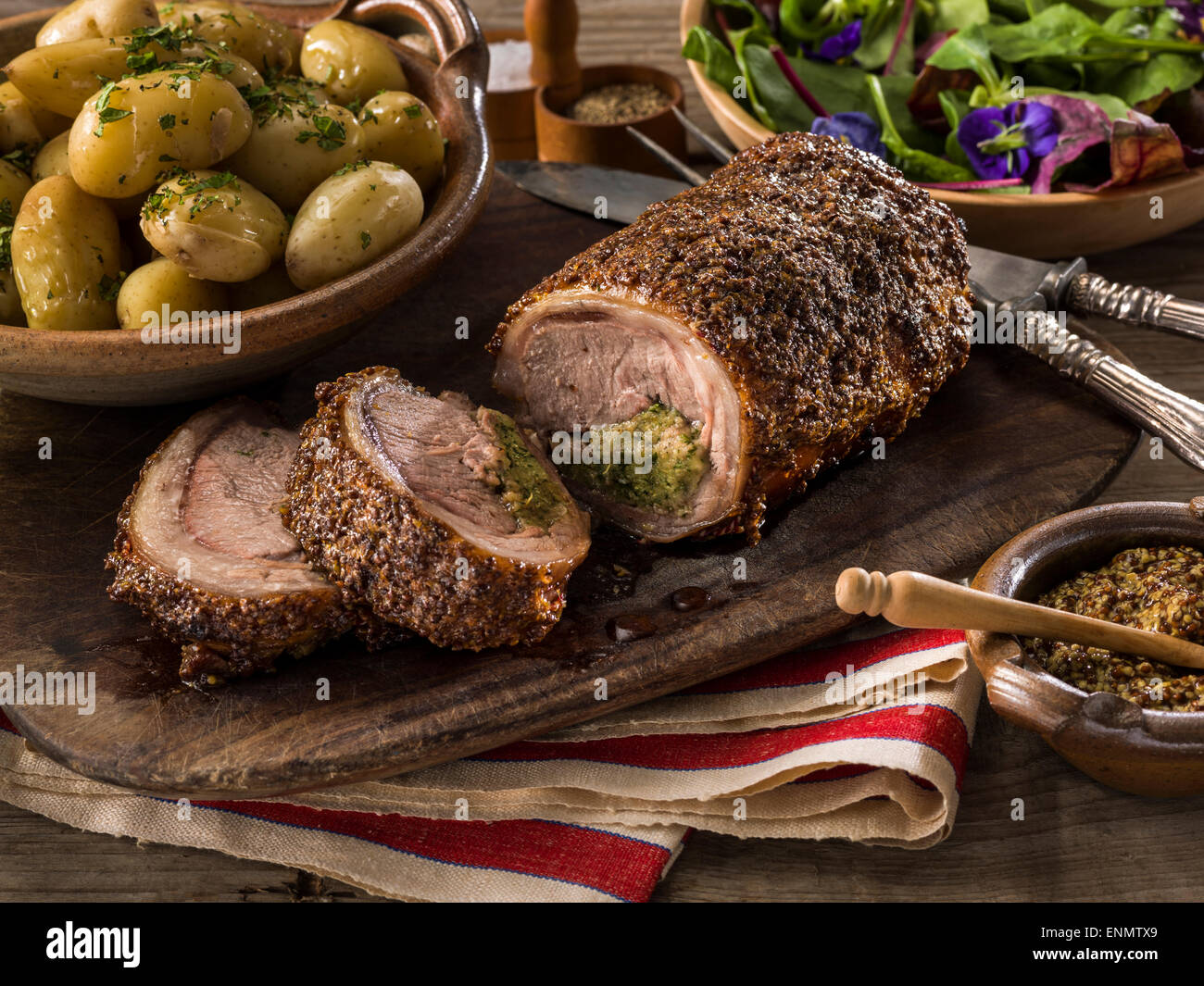 Lamb loin with herb stuffing Stock Photo - Alamy