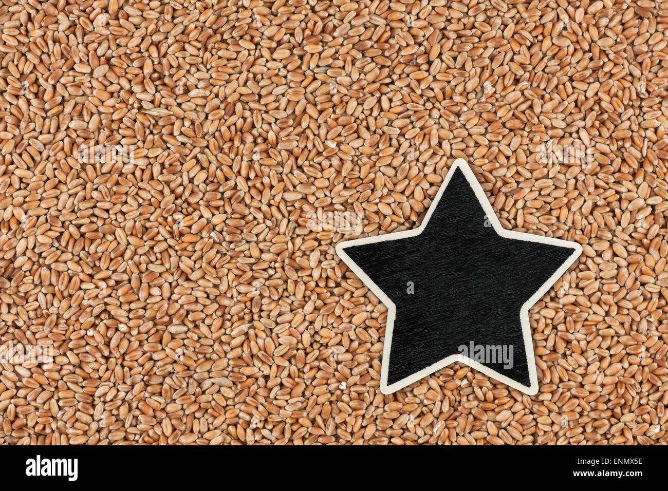 Star ,pointer, price, tag, lies on  wheat, with space for your text Stock Photo