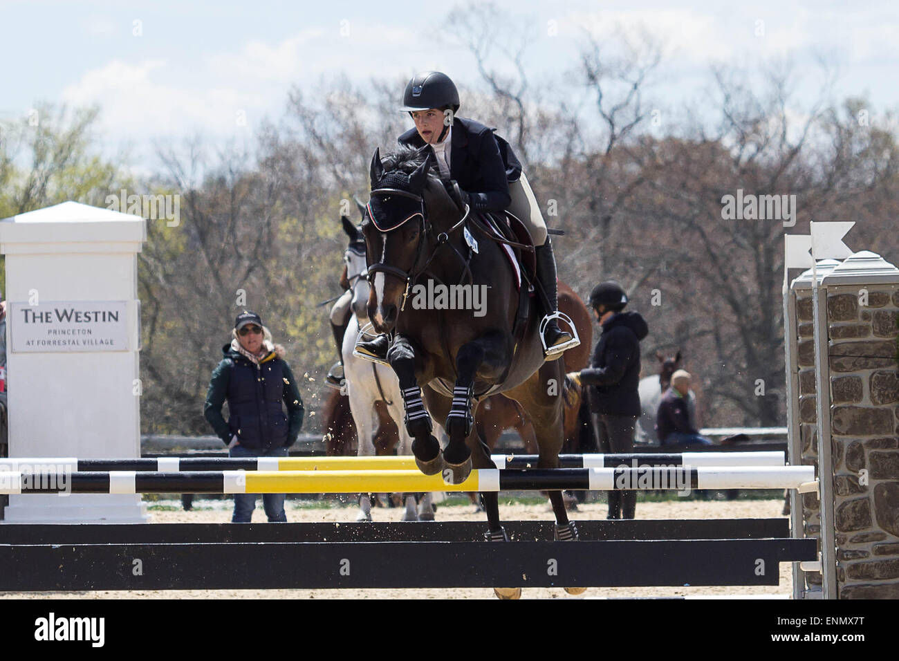 Princeton Equestrian Show Jumping a rider takes her horse over a jump