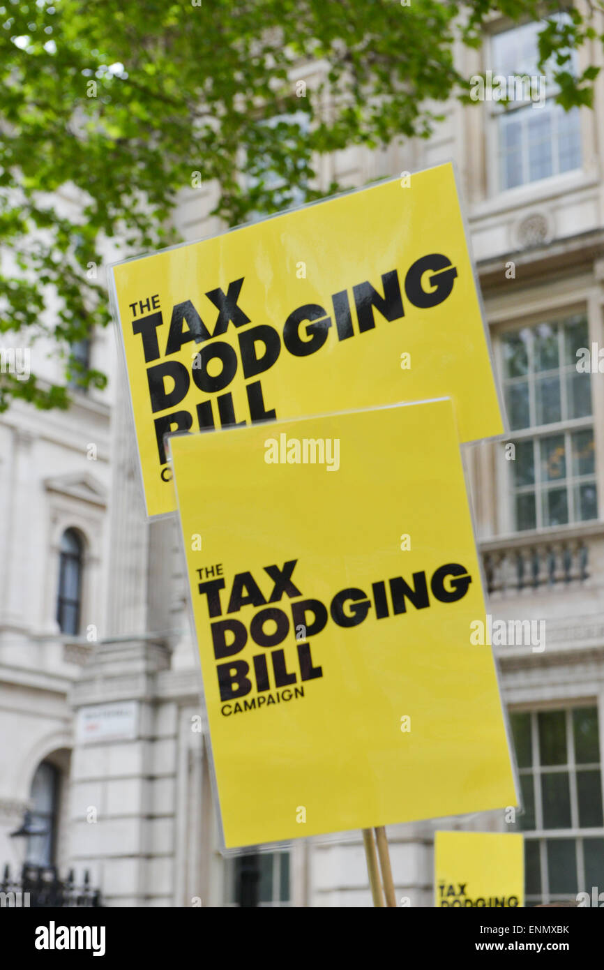 Downing Street, London, UK. 8th May 2015. An anti Tax dodging protest takes place outside Downing Street as the Conservatives win the General Election. Credit:  Matthew Chattle/Alamy Live News Stock Photo