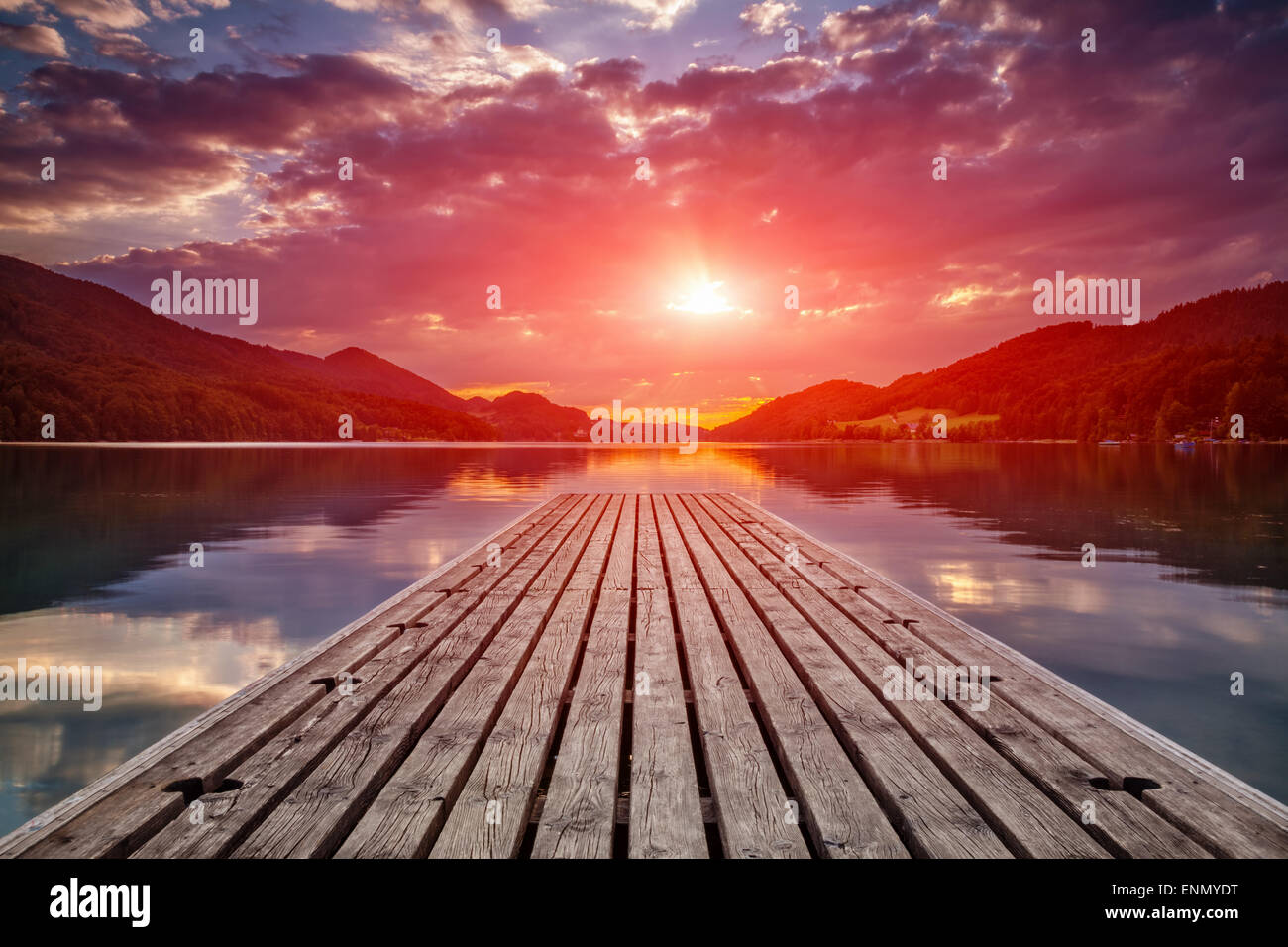 Beautiful sunset view from a wooden platform in Fuschl am see, Austria Stock Photo