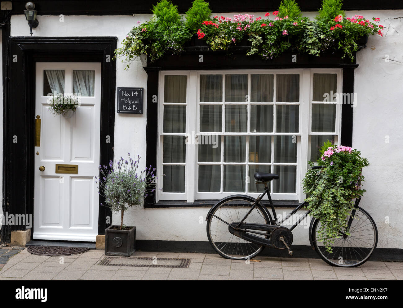 House with bicycle hi-res stock photography and images - Alamy