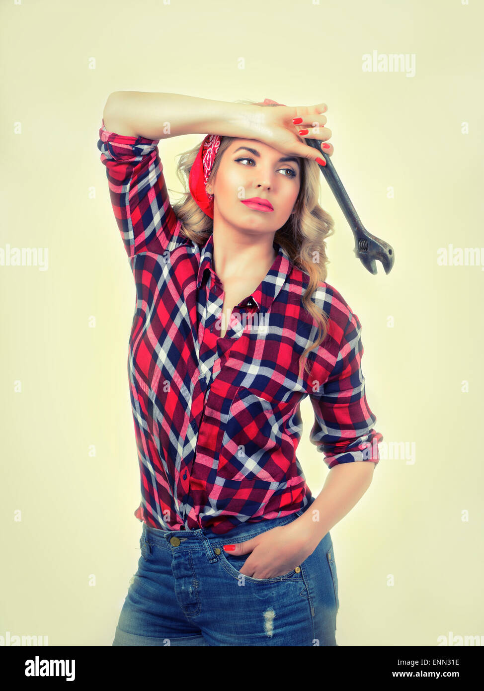 Girl with a wrench retro Stock Photo Alamy