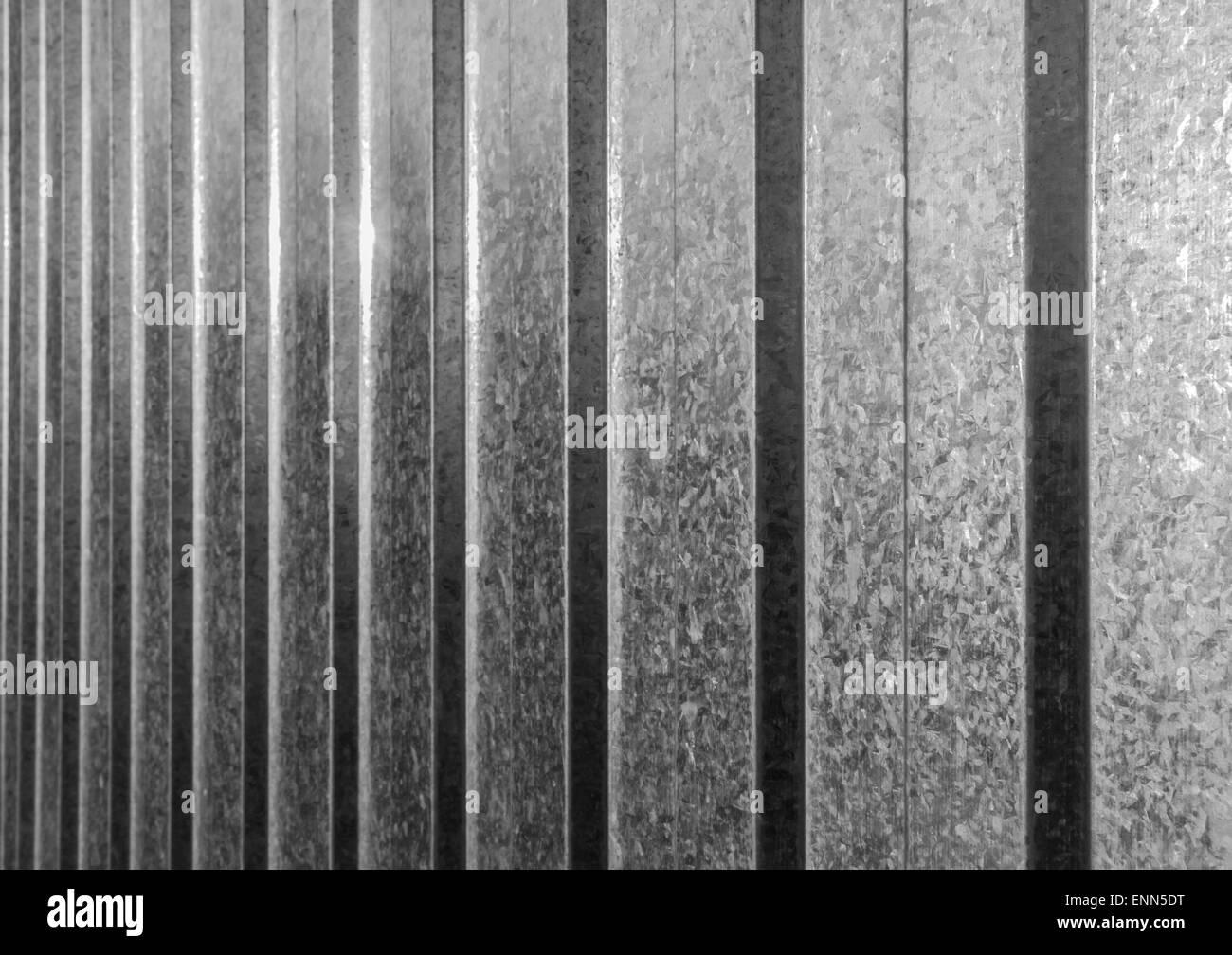 Abstract black and white stainless steel fencing sheet in sunlight ...