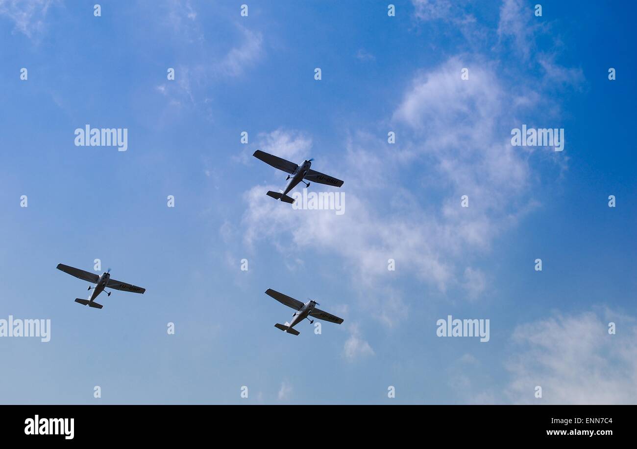 Group of old piston planes flying in formation at an air show in Vrsac, Serbia. Stock Photo