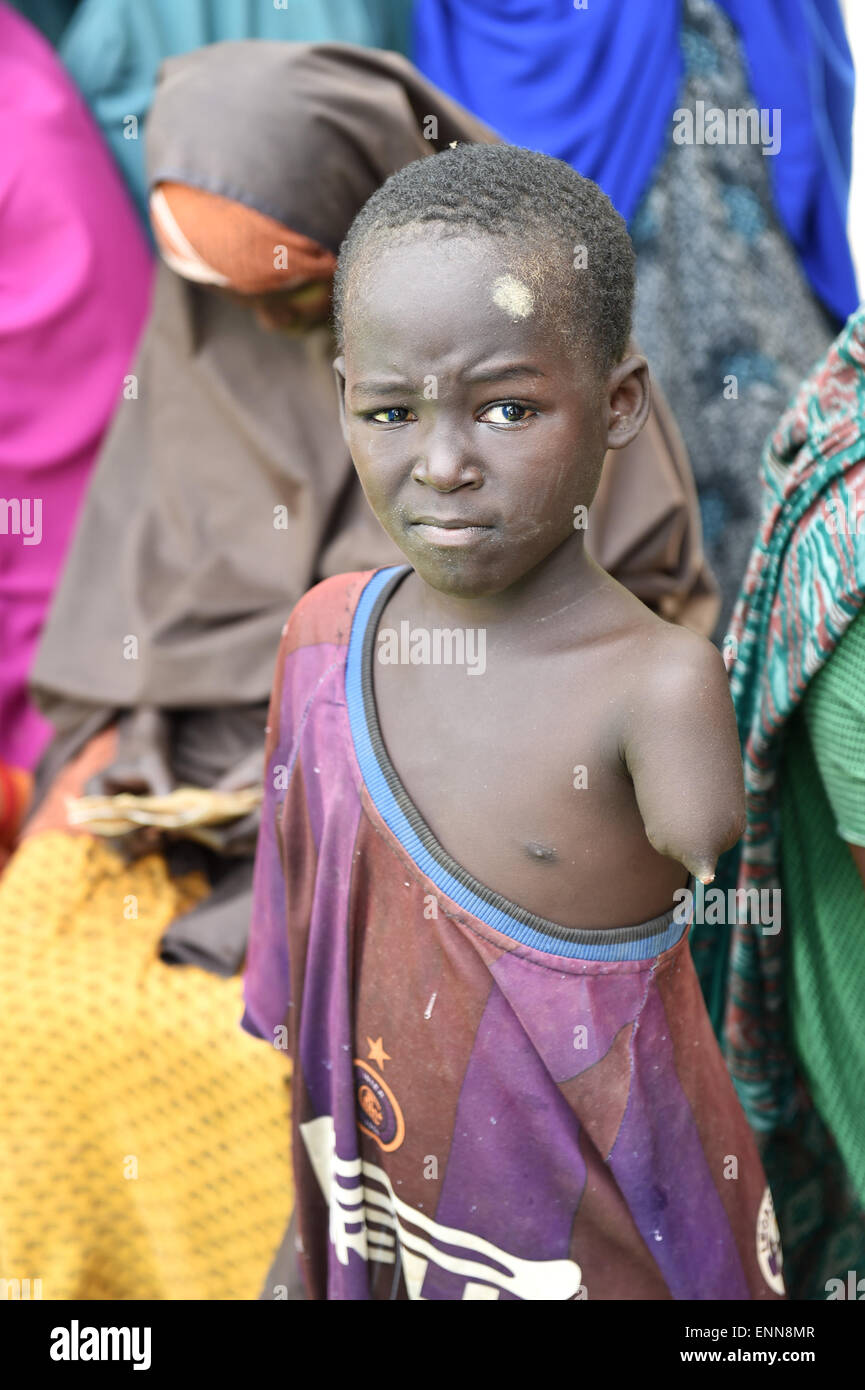 (150508) --DADAAB, May 8, 2015 (Xinhua) -- A Somali refugee boy is seen at Dadaab refugee camp in Kenya, May 8, 2015. Dadaab, the world's largest refugee camp in northeastern Kenya, currently houses some 350,000 people. For more than 20 years, it has been home to generations of Somalis who have fled their homeland wracked by conflicts. (Xinhua/Sun Ruibo) Stock Photo