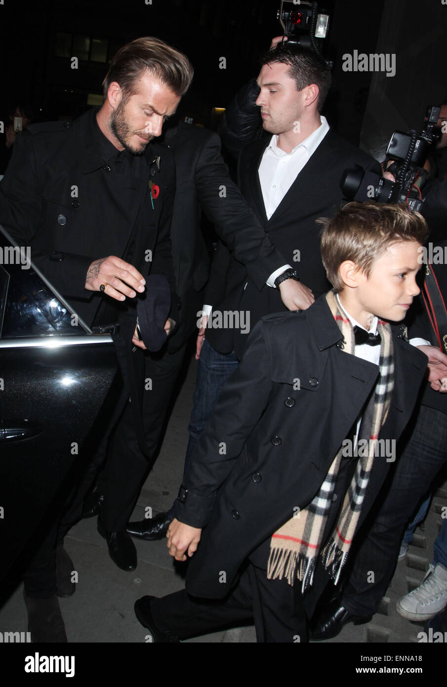 David Beckham, Victoria Beckham and Romeo Beckham arriving at the Burberry  store on Regent Street for the Burberry festive campaign starring Romeo  Beckham Featuring: David Beckham,Romeo Beckham Where: London, United  Kingdom When: