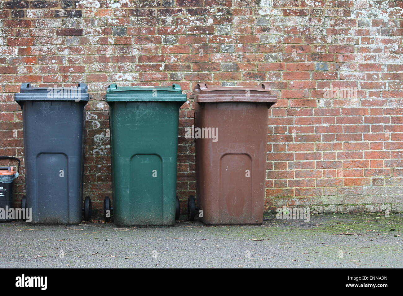 dustbins outside against brick wall trash, can, bin, dustbin, street