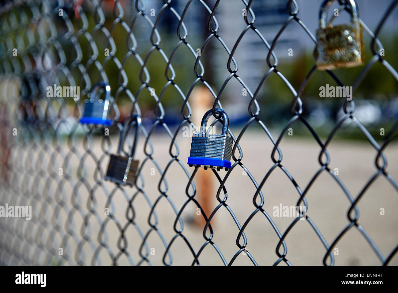 Locks on chain link fence hi-res stock photography and images - Alamy